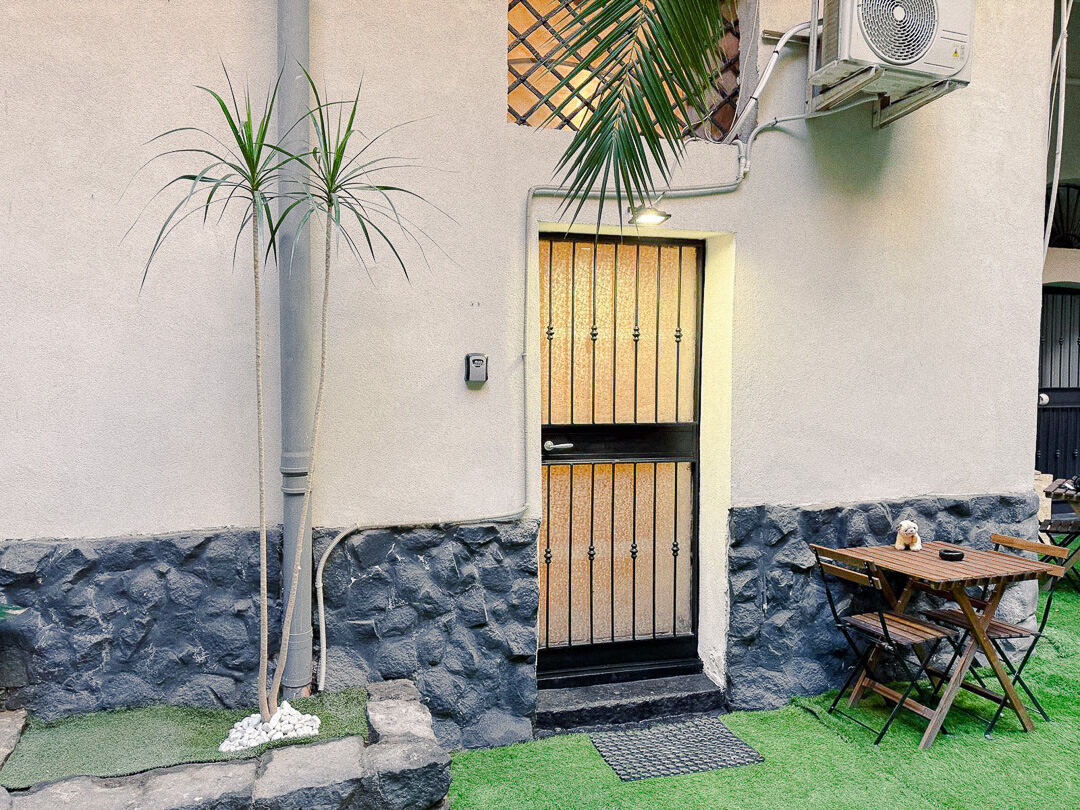 The bright living room of Lavika Loft in central Catania